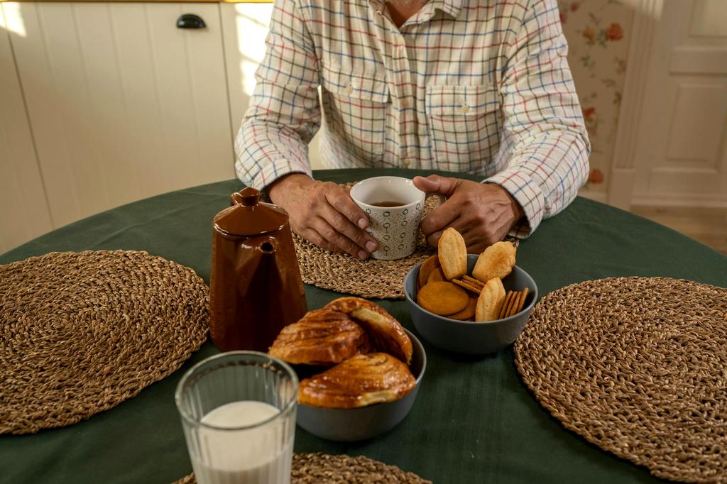 Breakfast spread with pancakes, eggs and coffee